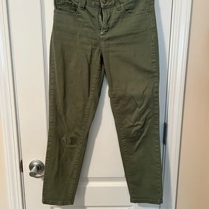 Green skinny jeans. Size 0P.